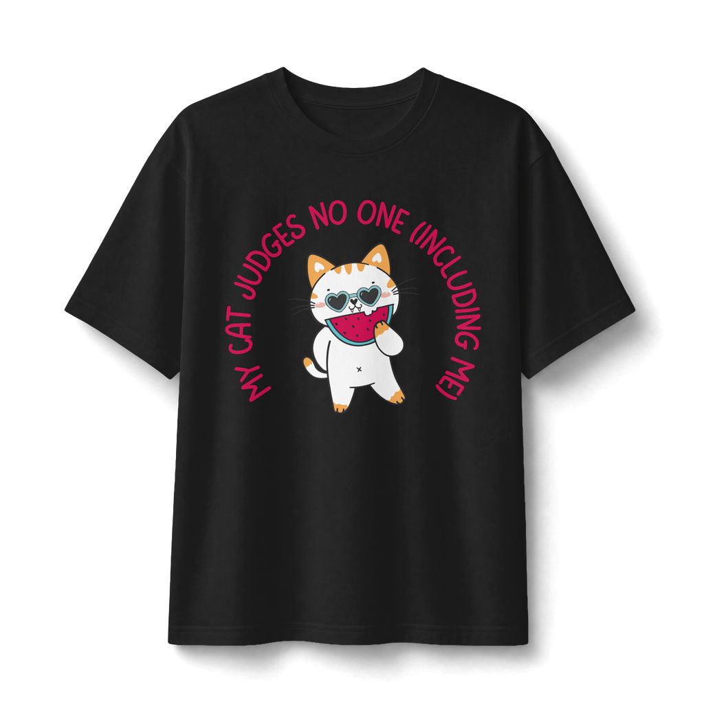 Cat Doesn’t Judge T‑Shirt — Cute Cat Holding Heart Graphic Tee (“My Cat Judges No One Including Me”)