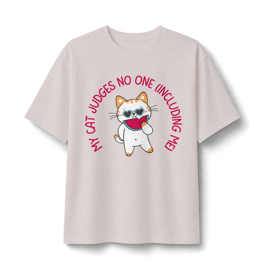 Cat Doesn’t Judge T‑Shirt — Cute Cat Holding Heart Graphic Tee (“My Cat Judges No One Including Me”)